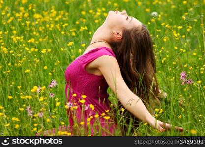 woman on flower field close portrait