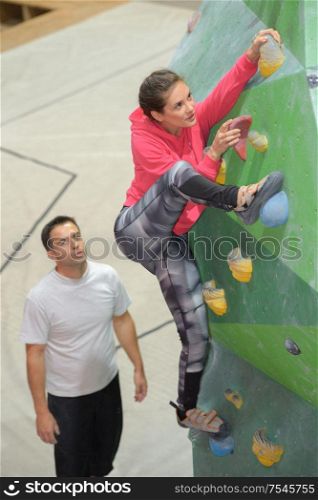woman on freestyle wall climbing