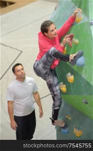 woman on freestyle wall climbing