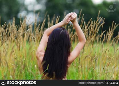 woman on grass field feel freedom