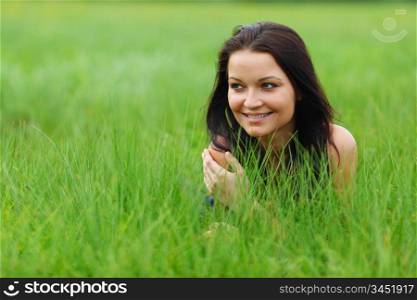 woman on grass in green fields