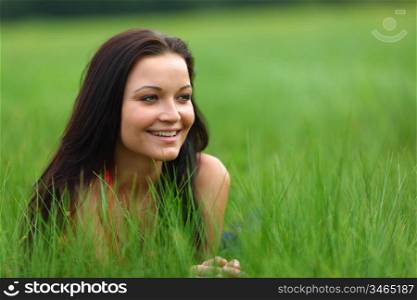 woman on grass in green fields