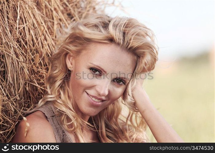 woman on hay close up portrait