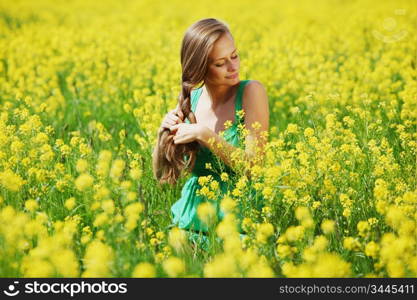 woman on oilseed field