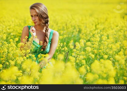 woman on oilseed field