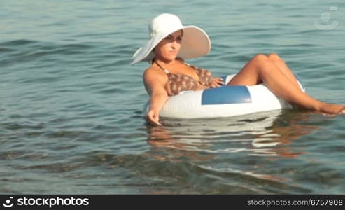 woman on raft enjoying