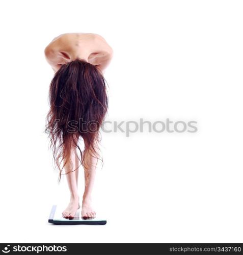 woman on scales isolated on white background