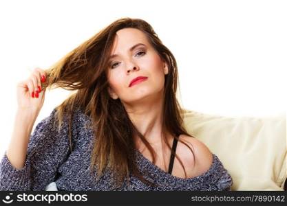 Woman on sofa. Girl lying on couch relaxing or taking power nap after lunch.