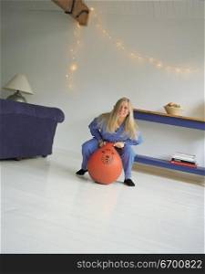 woman on spacehopper