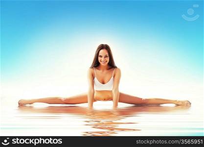 woman on straddle split in water