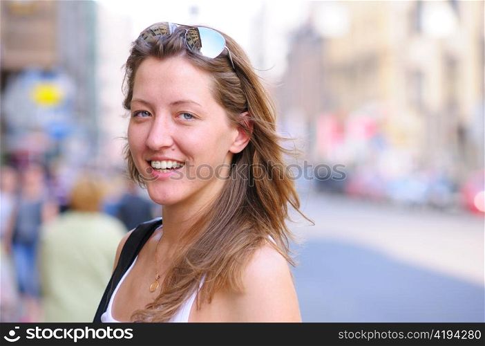 woman on sunny city street