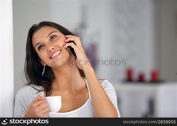 Woman on the phone at home