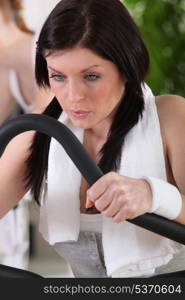 Woman on treadmill in gym