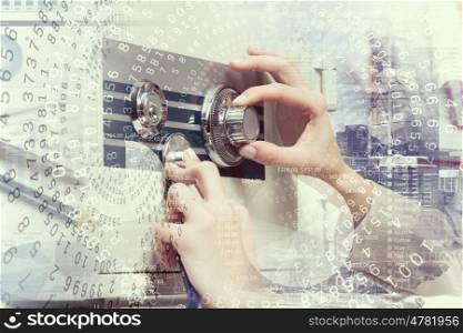 Woman open safe. Hands of woman dialing numbers on safe padlock
