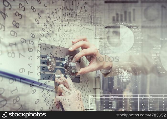 Woman open safe. Hands of woman dialing numbers on safe padlock