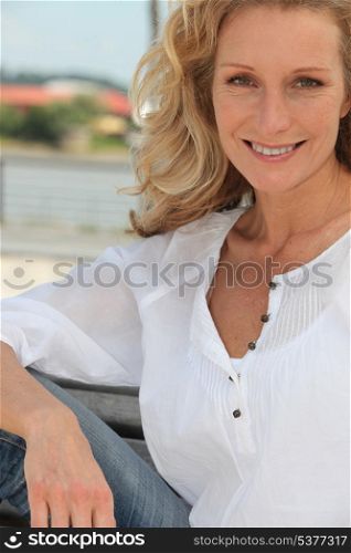 Woman outside smiling