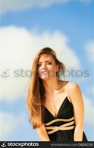 Woman outside summertime vacation day.