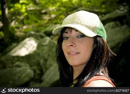 Woman outside with a sunhat