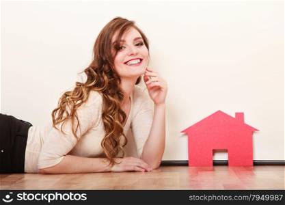 Woman paper house. Housing real estate concept. Smiling young woman girl holding paper house dreaming about new home. Housing and real estate concept.