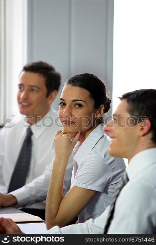Woman participating in a business meeting