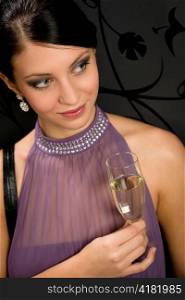 Woman party dress drink champagne glass glamorous look camera
