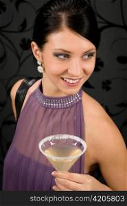 Woman party dress hold cocktail glass smiling look aside