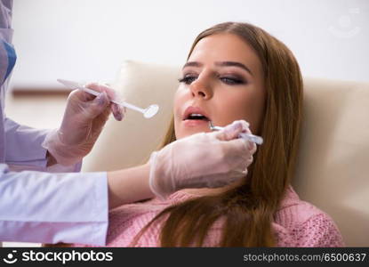 Woman patient visiting dentist for regular check-up