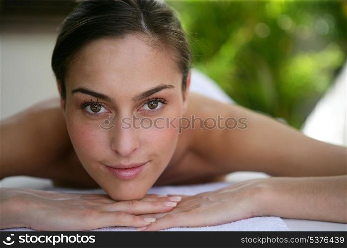 Woman patiently waiting for her back massage