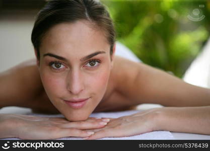 Woman patiently waiting for her back massage