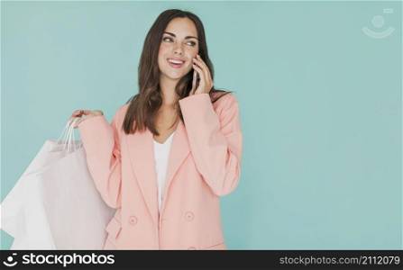 woman pink jacket looking left