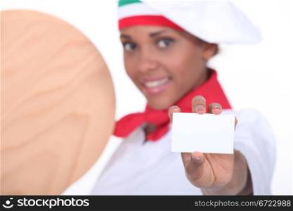 Woman pizza maker showing card