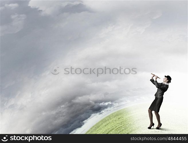 Woman play flute. Cheerful businesswoman in suit and bowler hat playing fife