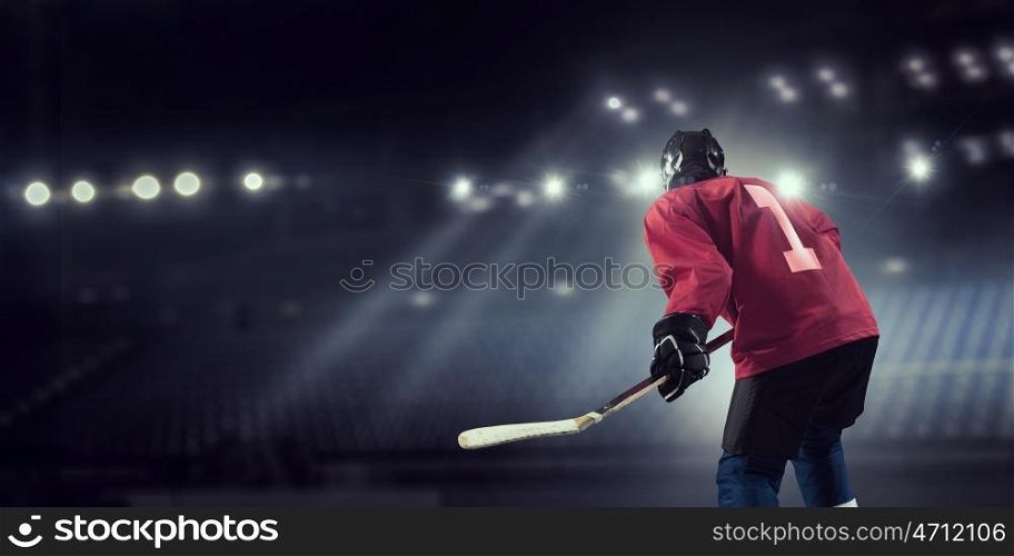Woman play hockey mixed media. Woman ice hockey player during a game