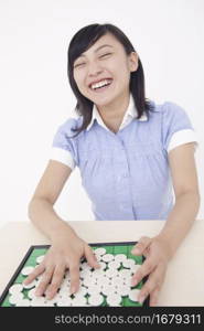 woman playing board game