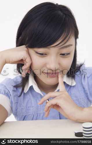 woman playing board game