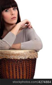 Woman playing bongo
