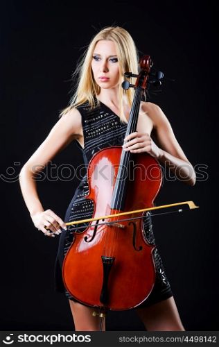 Woman playing cello on white