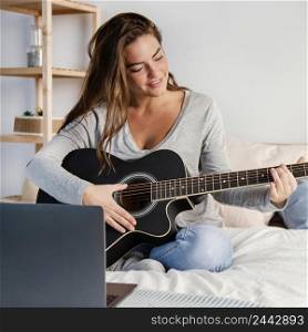 woman playing guitar streaming 2
