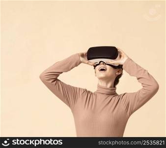 woman playing virtual reality headset looking up