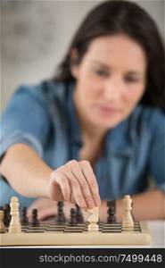 woman plays chess