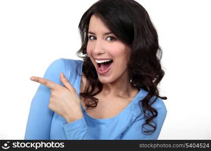Woman pointing and laughing