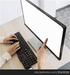woman pointing blank desktop screen