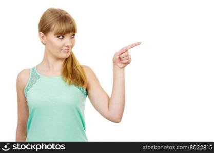 Woman pointing or touching with index finger . Woman blonde casual style girl pointing or touching with index fingers at something isolated on white