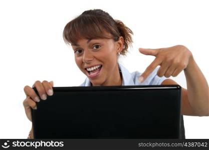 Woman pointing to laptop