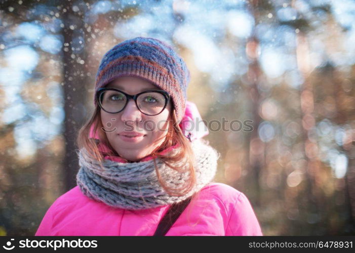 woman portrait in a winter forest. beautiful woman portrait in a winter forest