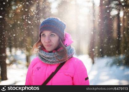 woman portrait in a winter forest. beautiful woman portrait in a winter forest