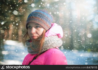 woman portrait in a winter forest. beautiful woman portrait in a winter forest