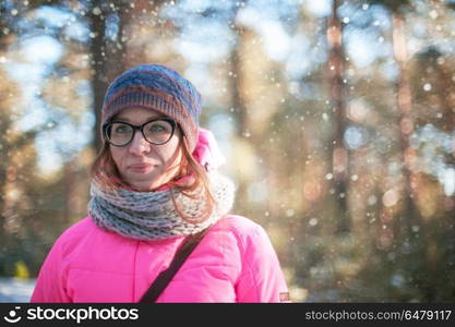 woman portrait in a winter forest. beautiful woman portrait in a winter forest