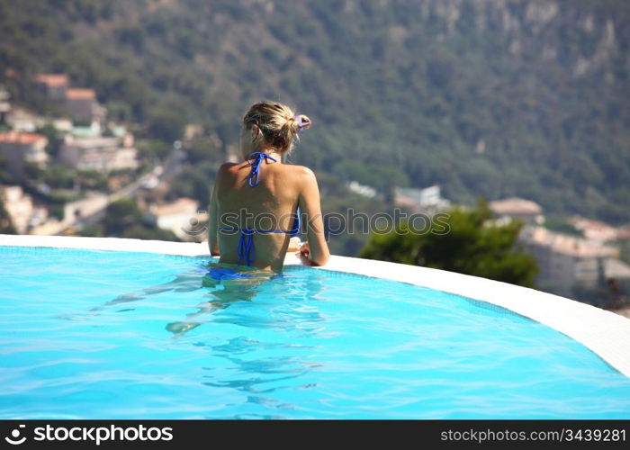 woman portrait in swimming pool