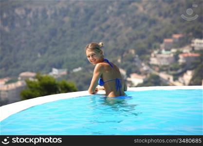 woman portrait in swimming pool